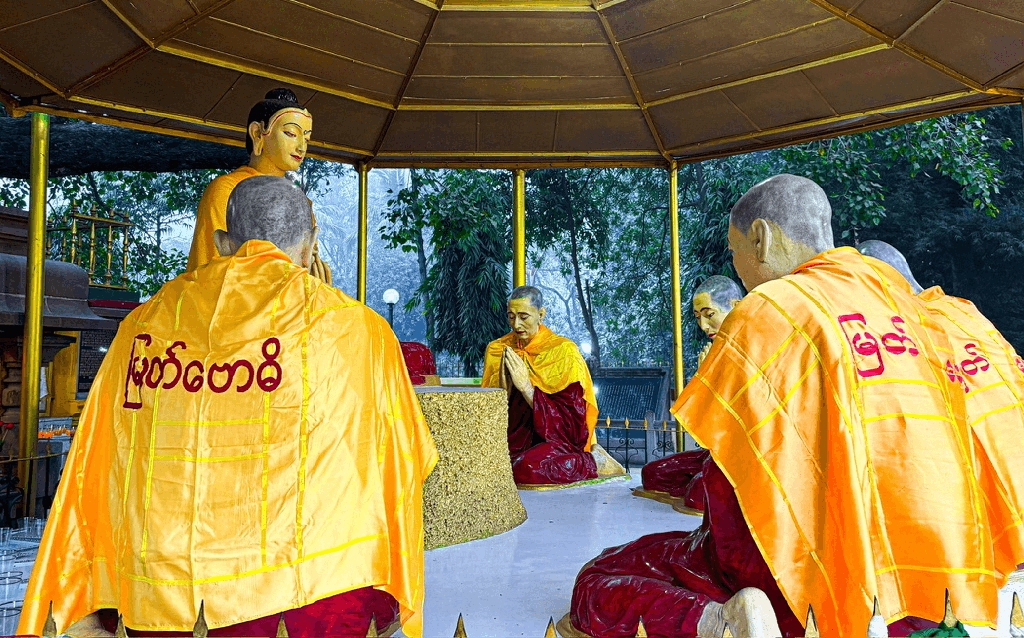 Buddha delivering his first sermon to his initial five disciples.