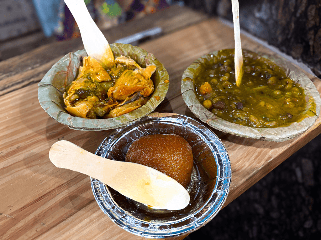Samosa with chutney (leftmost), Gulab jamun and Aloo tikki chaat (rightmost)